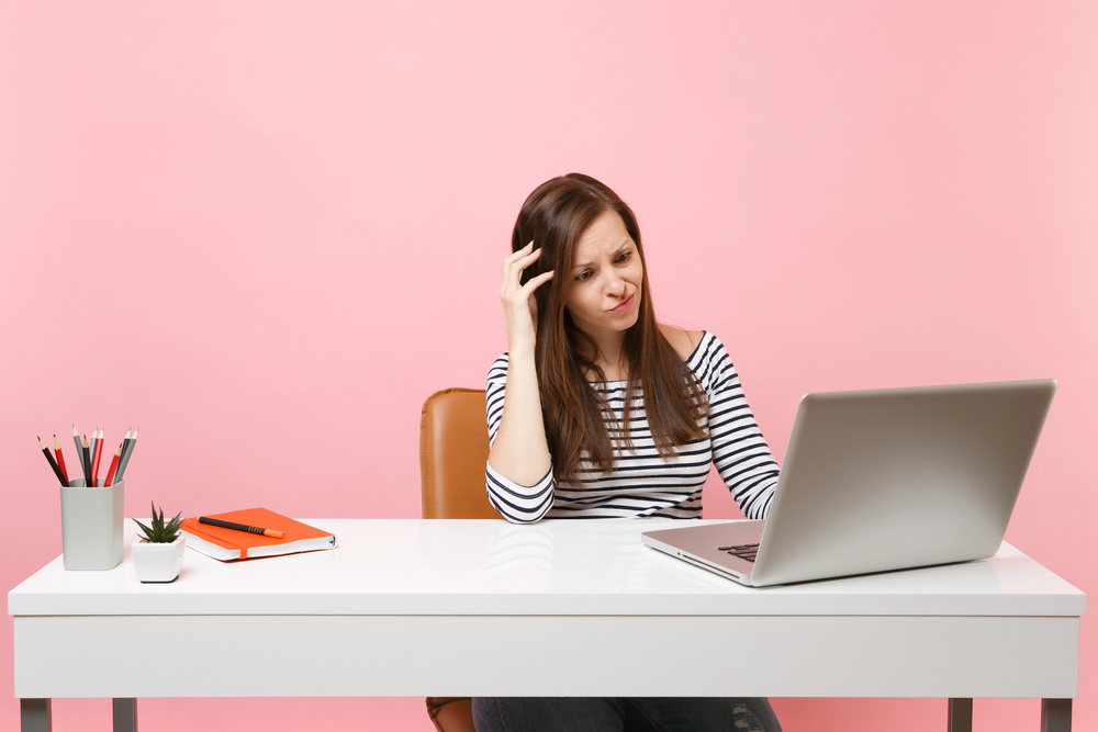 Woman typing trying to repupose content