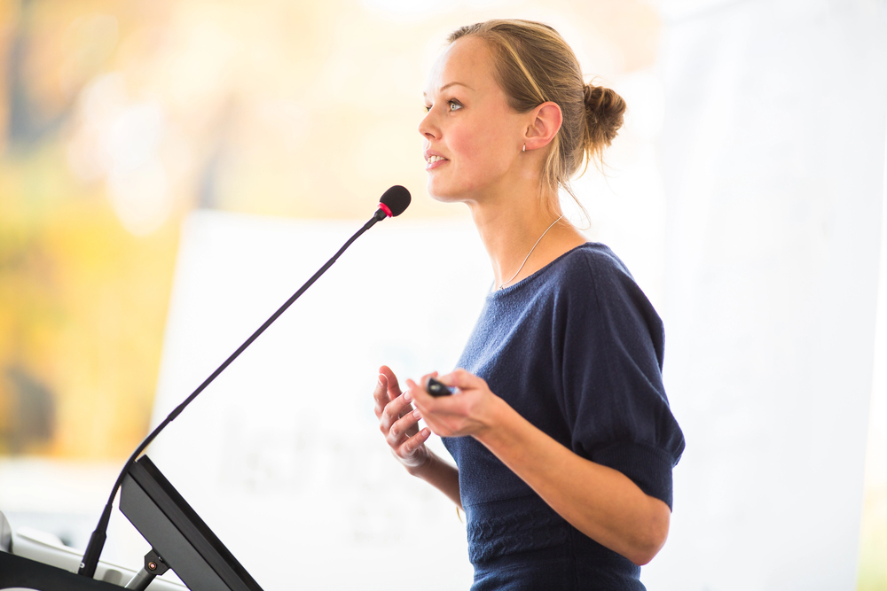 woman delivering her signature talk